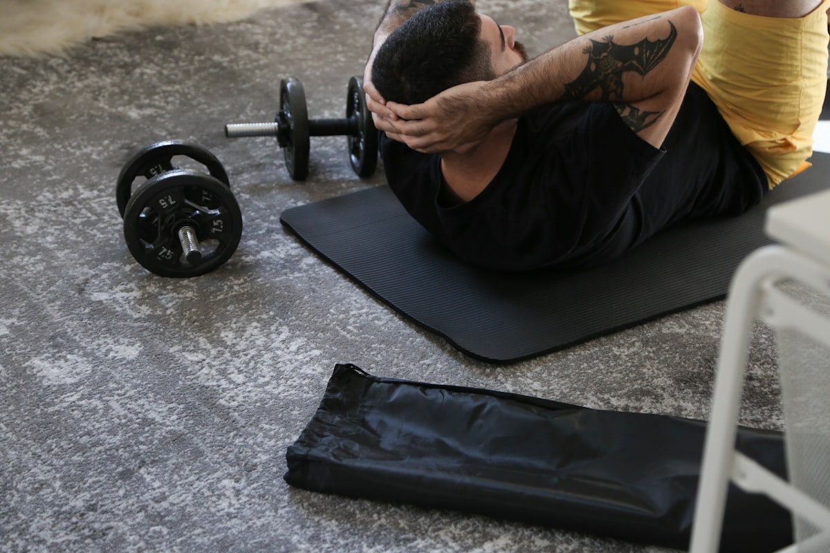 Man performing yoga recovery stretch